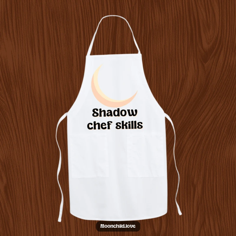 Funny geometric crescent moon silhouette casting bold shadows, on a functional and humorous apron.