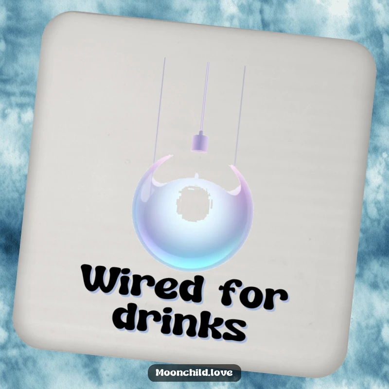 Funny metallic orb suspended by glowing wires on a set of protective drink coasters.