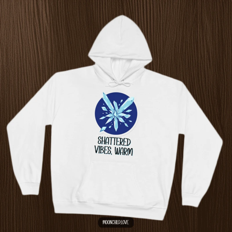 Funny geometric shards exploding against a dark indigo background, printed on a cozy hoodie.