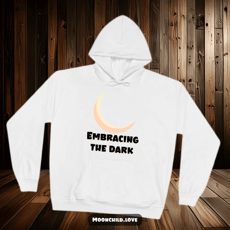 Funny geometric crescent moon silhouette casting bold shadows, depicted on a warm and humorous hoodie.