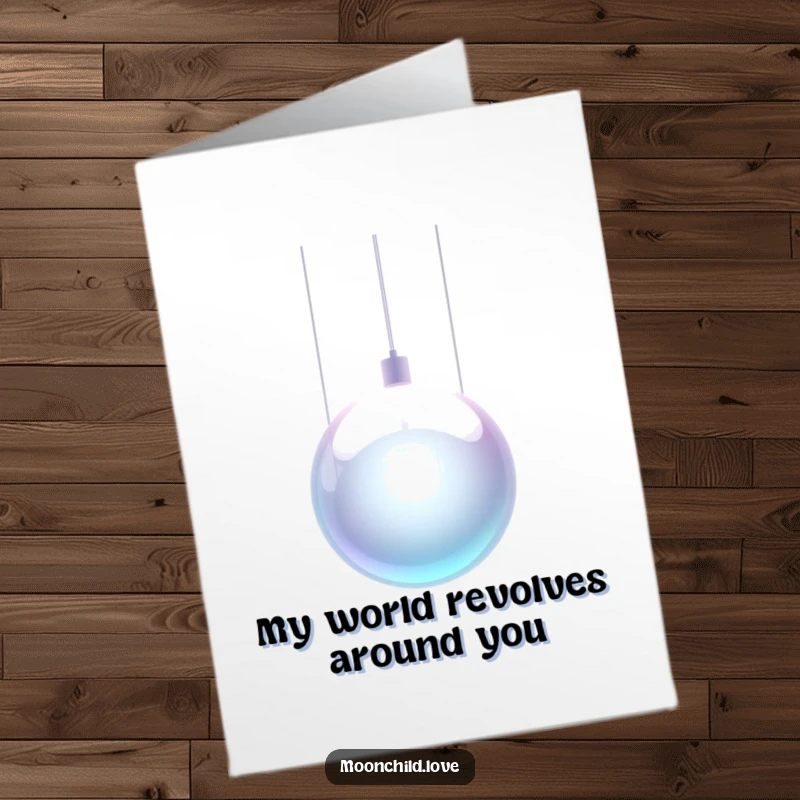 Futuristic Free Printable Thank You Card: A sleek, metallic orb suspended by thin, glowing wires, conveying deep gratitude.